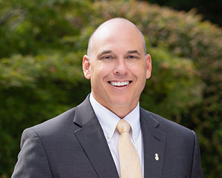 Headshot of Southern First Banker, Adam Cato.