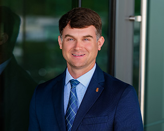 Headshot of Blake Taylor, Southern First banker.