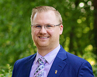 Headshot of Southern First banker, Brandon Stevens.