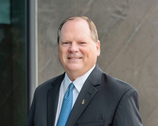 Headshot of Southern First Banker, Chris Blue.