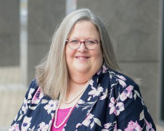 Headshot of Debbie Tucker, Southern First banker.