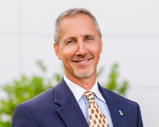 Headshot of Greg McCoy McCoy