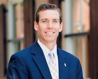 Headshot of Kevin Lee, Southern First Executive Director of Market Support.