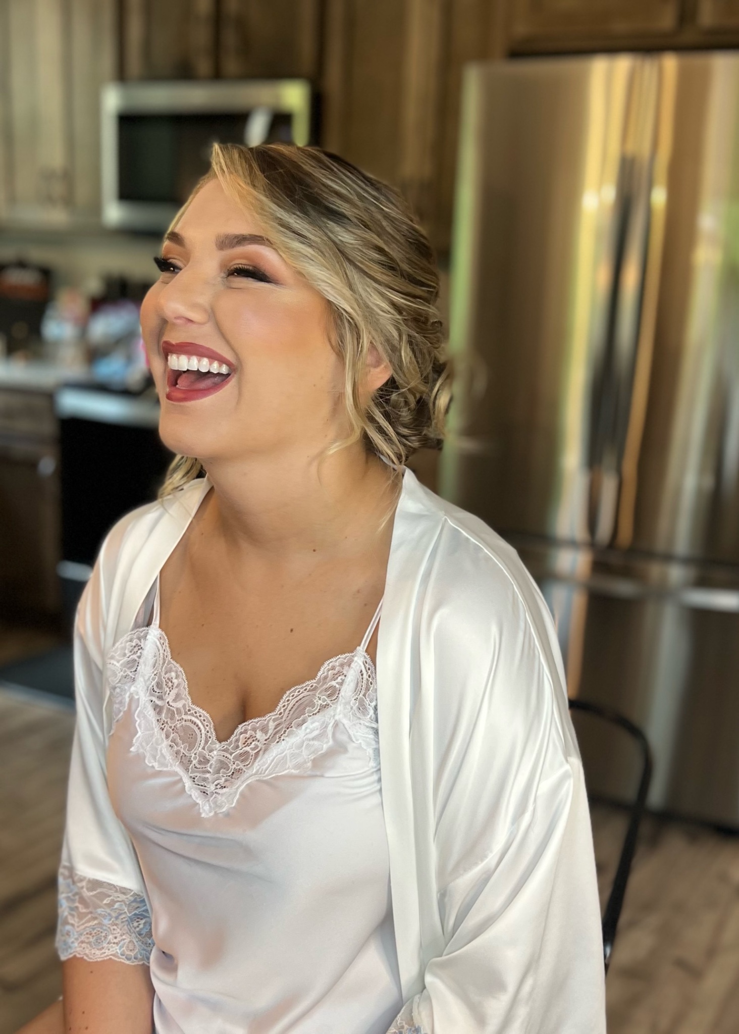 HR Business Partner Ashley Wilson on her wedding day after having her makeup done by Val Gonzalez.