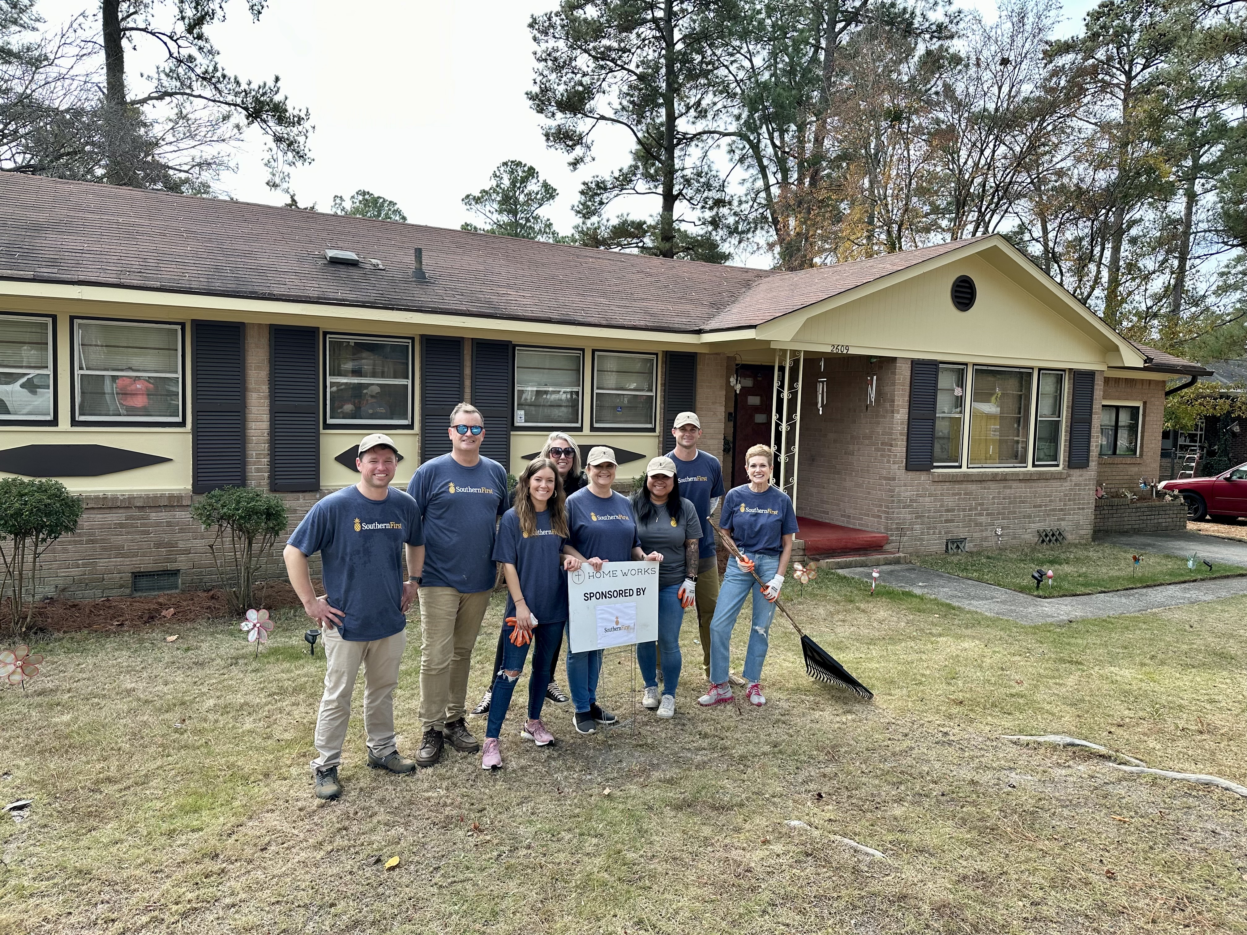 The Columbia team volunteering with Home Works.