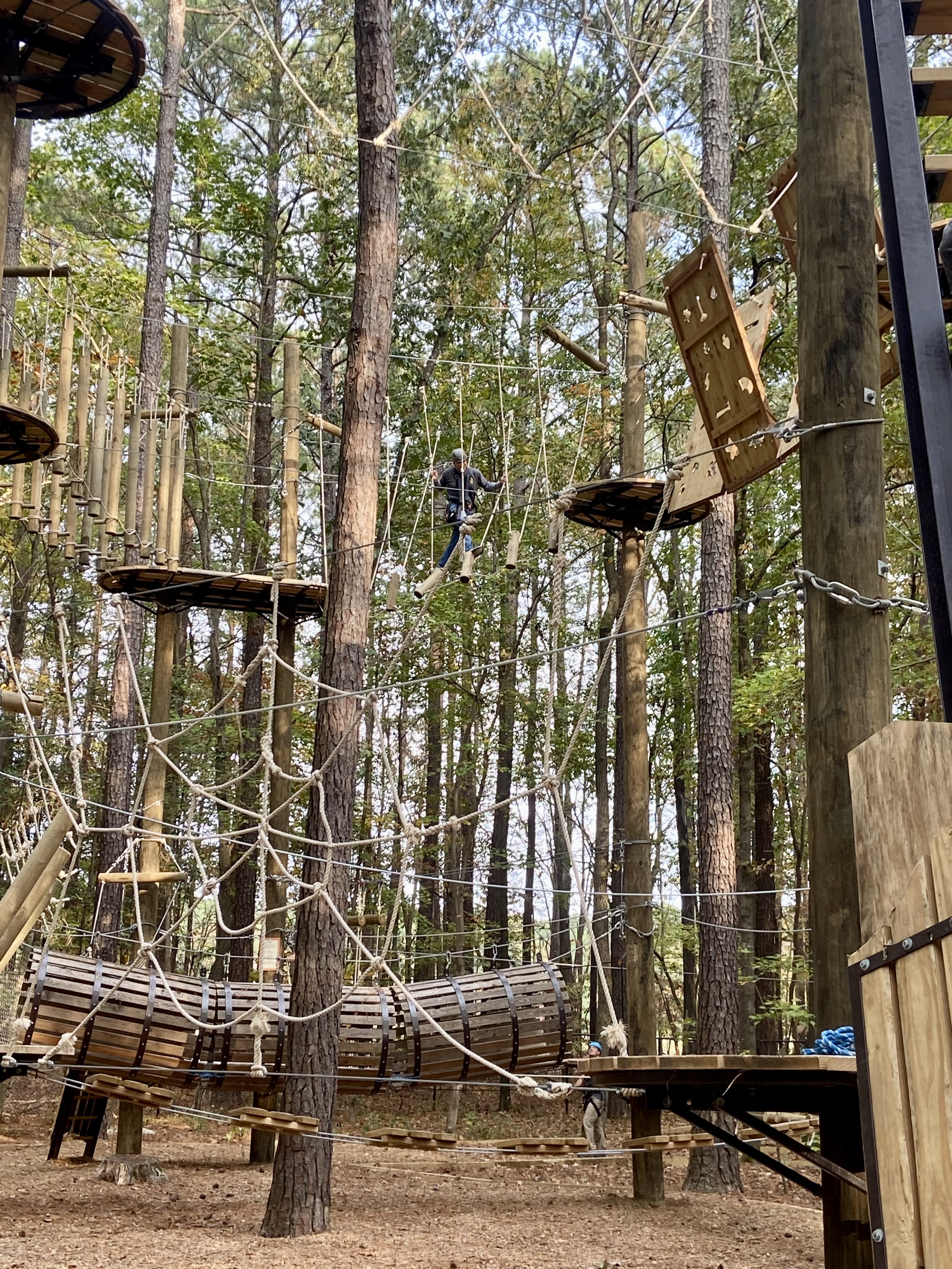 One of our Raleigh bankers navigating a ropes course.