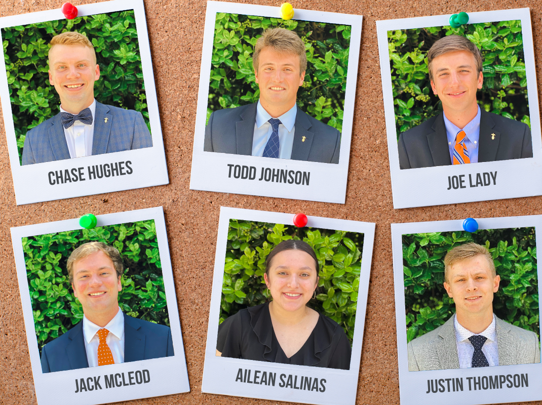 Corkboard with six polaroid photos of Southern First's interns pinned to it.