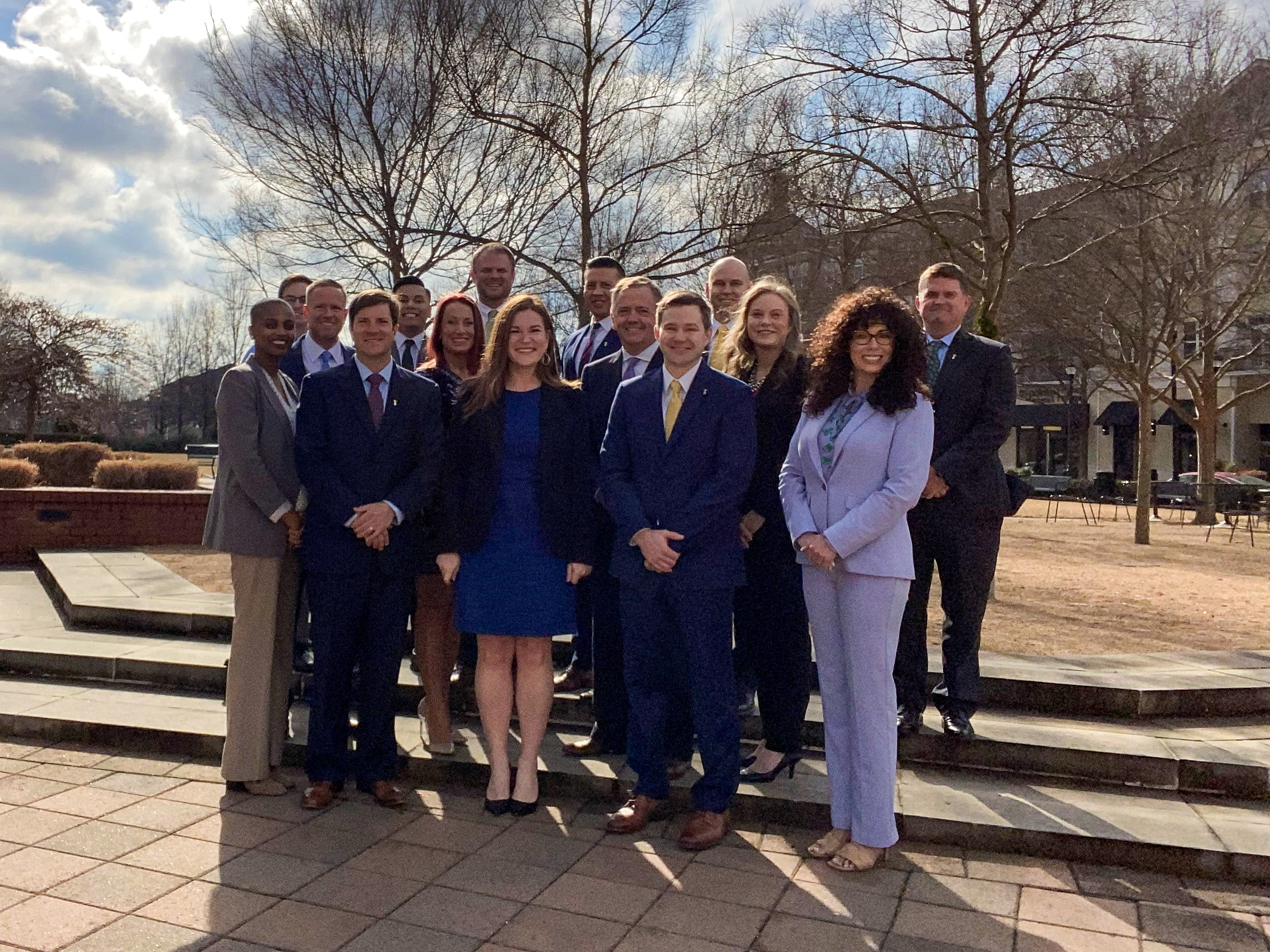 Group photo of our Raleigh team outside the office.